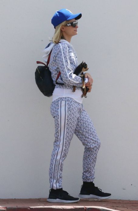 Paris Hilton – With her dog in Malibu
