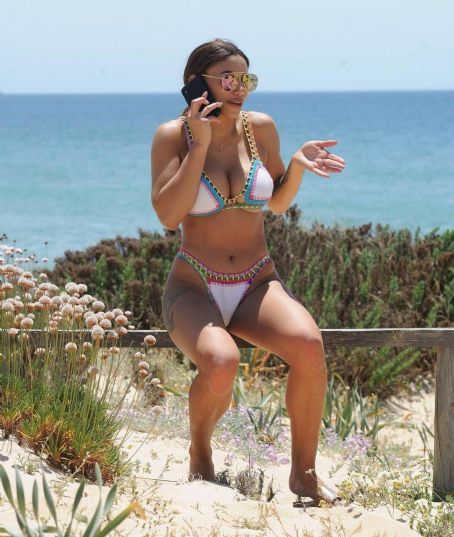 Kayleigh Morris – Bikini candids on the beach in Spain