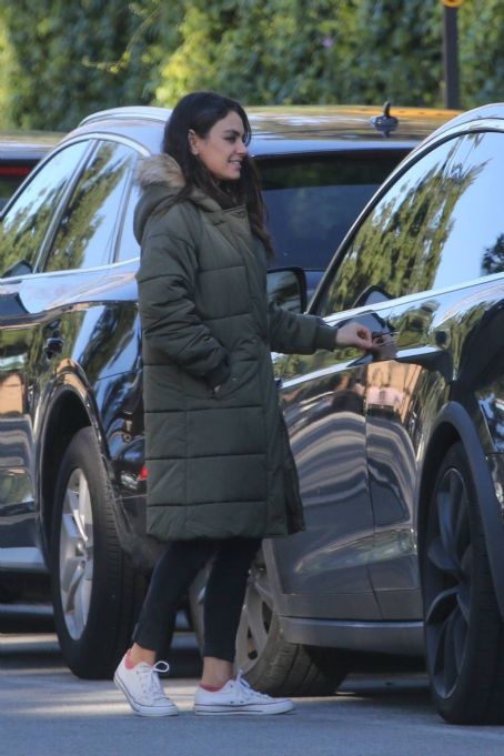 Mila Kunis – Out in olive green puffer jacket in Beverly Hills