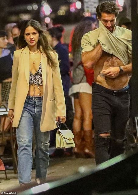 Eiza Gonzalez bares taut midriff while lacrosse boyfriend Paul Rabil flashes chiseled abs as he lifts shirt to wipe away sweat during fun night out in WeHo with model Barbara Palvin
