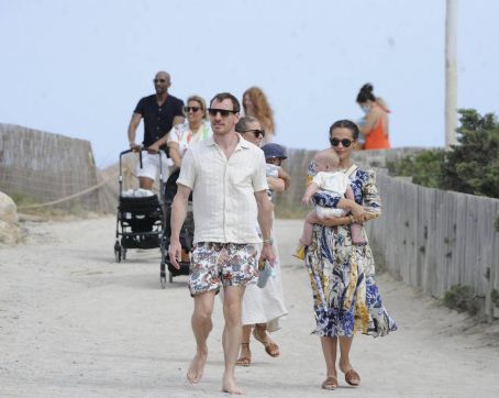alicia vikander and michael fassbender step out for a walk with their baby  and some friends in ibiza, spain-240821_3