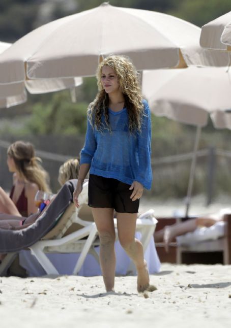 Shakira and her family on a beach in Ibiza, Spain