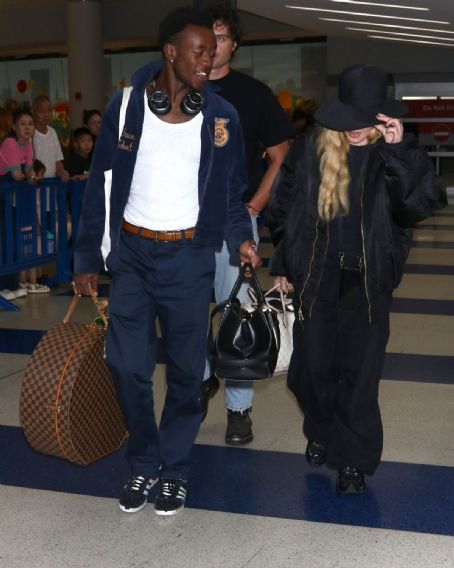 Madonna  wore a wide-brimmed hat at JFK Airport in New York