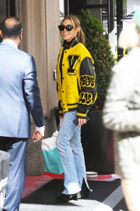 Eileen Gu – In a yellow Louis Vuitton college jacket shopping at ...