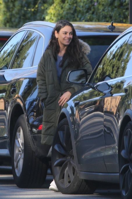 Mila Kunis – Out in olive green puffer jacket in Beverly Hills