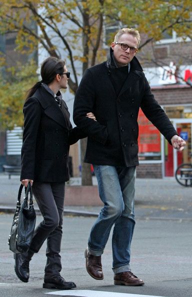 Paul Bettany wears a pea coat and horn rimmed glasses while out with pregnant wife Jennifer Connelly