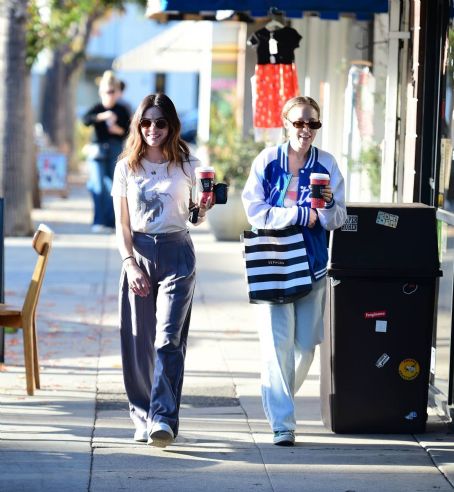 Lucy Hale – On a Christmas shopping with a friend in Los Angeles